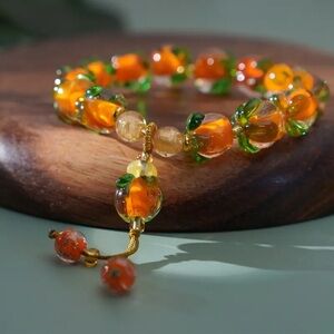 Orange Green Glass Beaded Bracelet Fruit Charm Adjustable Pull Tie NWT